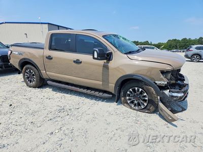 Czwarte zdjęcie samochodu z boku: 2024 NISSAN TITAN PRO-4X VIN:1N6AA1ED0RN101474 - miniatura