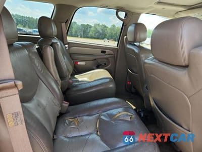 Zdjęcie 11 z 13 samochodu: 2003 GMC YUKON DENALI VIN:1GKEK63U73J165760 - miniatura
