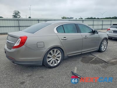 Trzecie zdjęcie samochodu z tyłu: 2015 LINCOLN MKS VIN:1LNHL9FT7FG607914 - miniatura