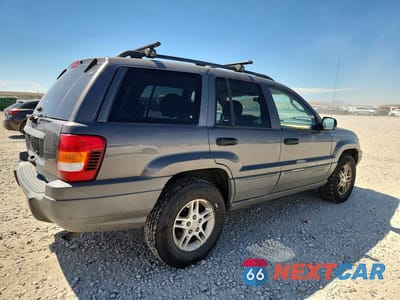 Trzecie zdjęcie samochodu z tyłu: 2002 JEEP GRAND CHEROKEE LAREDO VIN:1J4GW48S82C169852 - miniatura