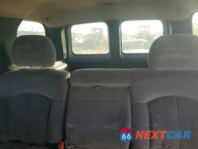 Zdjęcie 10 z 14 samochodu: 2002 CHEVROLET TAHOE C1500 VIN:1GNEC13V82R221894 - miniatura