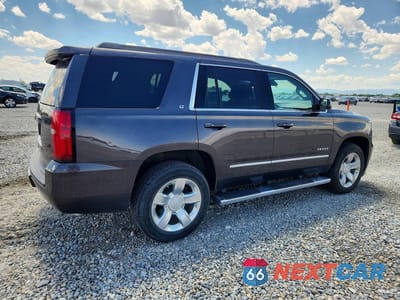 Trzecie zdjęcie samochodu z tyłu: 2018 CHEVROLET TAHOE K1500 LT VIN:1GNSKBKC4JR214810 - miniatura