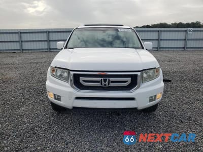 Piąte zdjęcie samochodu w środku: 2011 HONDA RIDGELINE RTL VIN:5FPYK1F57BB454103 - miniatura