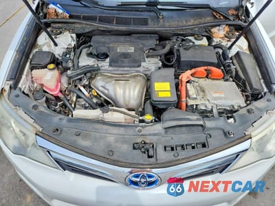 Zdjęcie 11 z 12 samochodu: 2012 TOYOTA CAMRY HYBRID LE VIN:4T1BD1FK9CU062078 - miniatura
