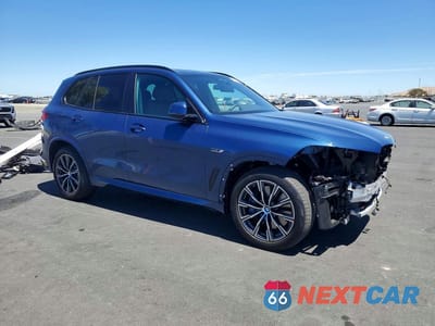 Czwarte zdjęcie samochodu z boku: 2022 BMW X5 XDRIVE45E VIN:5UXTA6C02N9M41199 - miniatura