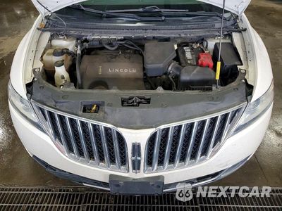 Zdjęcie 12 z 13 samochodu: 2013 LINCOLN MKX VIN:2LMDJ8JK7DBL22216 - miniatura