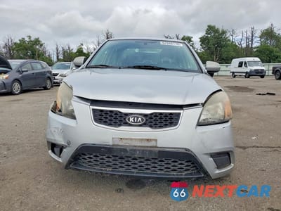 Piąte zdjęcie samochodu w środku: 2011 KIA RIO LX VIN:KNADH4A35B6949373 - miniatura