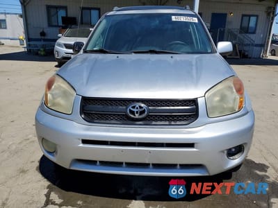 Piąte zdjęcie samochodu w środku: 2004 TOYOTA RAV4 BASE VIN:JTEGD20V640029983 - miniatura