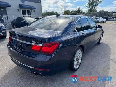 Trzecie zdjęcie samochodu z tyłu: 2015 BMW 750 XI VIN:WBAYB6C5XFD965910 - miniatura