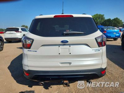 Zdjęcie 6 z 13 samochodu: 2017 FORD ESCAPE TITANIUM VIN:1FMCU9J90HUB43906 - miniatura