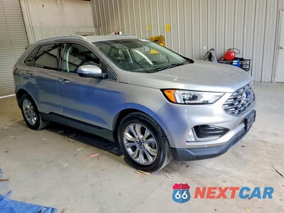 Czwarte zdjęcie samochodu z boku: 2020 FORD EDGE TITANIUM VIN:2FMPK3K96LBA30592 - miniatura