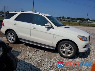 Czwarte zdjęcie samochodu z boku: 2012 MERCEDES-BENZ ML 350 BLUETEC VIN:4JGDA2EB7CA001886 - miniatura
