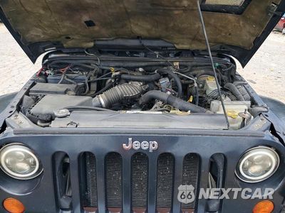 Zdjęcie 11 z 12 samochodu: 2008 JEEP WRANGLER UNLIMITED SAHARA VIN:1J8GA59128L533362 - miniatura
