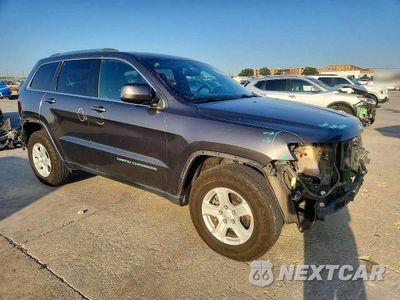 Czwarte zdjęcie samochodu z boku: 2014 JEEP GRAND CHEROKEE LAREDO VIN:1C4RJFAG9EC367570 - miniatura