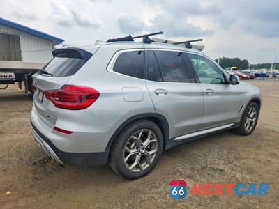 Trzecie zdjęcie samochodu z tyłu: 2021 BMW X3 XDRIVE30E VIN:5UXTS1C05M9F02501 - miniatura