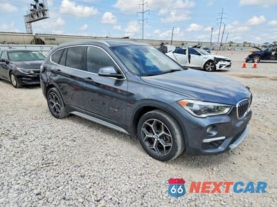 Czwarte zdjęcie samochodu z boku: 2018 BMW X1 XDRIVE28I VIN:WBXHT3C34J5K27989 - miniatura