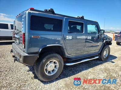 Trzecie zdjęcie samochodu z tyłu: 2005 HUMMER H2 VIN:5GRGN23U15H116762 - miniatura