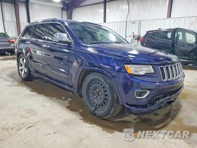 Czwarte zdjęcie samochodu z boku: 2014 JEEP GRAND CHEROKEE OVERLAND VIN:1C4RJFCGXEC579665 - miniatura