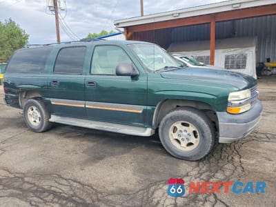 Czwarte zdjęcie samochodu z boku: 2004 CHEVROLET SUBURBAN C1500 VIN:3GNEC16Z84G259918 - miniatura
