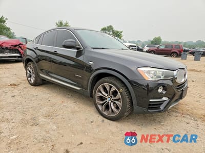 Czwarte zdjęcie samochodu z boku: 2015 BMW X4 XDRIVE35I VIN:5UXXW5C56F0E87099 - miniatura