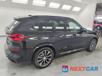 Trzecie zdjęcie samochodu z tyłu: 2026 BMW X5 M60I VIN:5UX33EU01T9383618 - miniatura