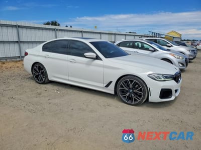 Czwarte zdjęcie samochodu z boku: 2021 BMW 540 I VIN:WBA53BJ06MCF38231 - miniatura
