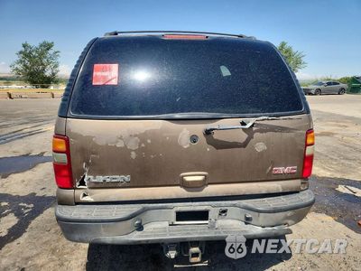 Zdjęcie 6 z 13 samochodu: 2003 GMC YUKON VIN:1GKEC13Z93R279899 - miniatura