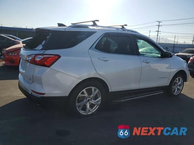 Trzecie zdjęcie samochodu z tyłu: 2018 CHEVROLET EQUINOX LT VIN:2GNAXKEX1J6315410 - miniatura