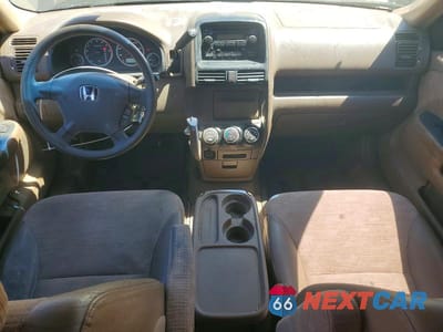 Zdjęcie 8 z 12 samochodu: 2004 HONDA CR-V LX VIN:JHLRD68434C007800 - miniatura