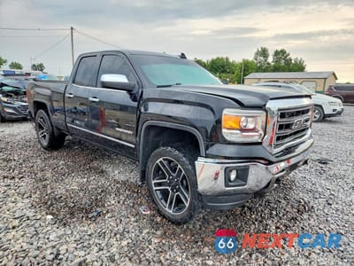 Czwarte zdjęcie samochodu z boku: 2015 GMC SIERRA K1500 SLT VIN:1GTV2VEC9FZ422773 - miniatura
