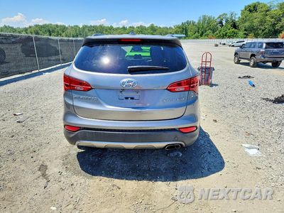 Zdjęcie 6 z 12 samochodu: 2014 HYUNDAI SANTA FE SPORT 2.4L VIN:5XYZUDLB5EG200535 - miniatura