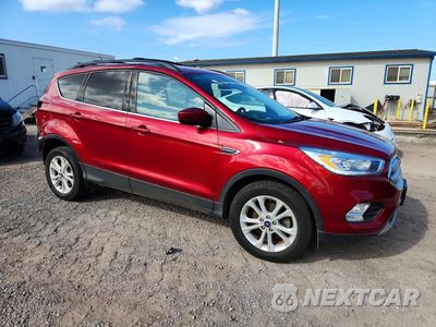 Czwarte zdjęcie samochodu z boku: 2018 FORD ESCAPE SEL VIN:1FMCU0HD4JUA04714 - miniatura