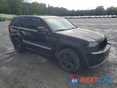Czwarte zdjęcie samochodu z boku: 2006 JEEP GRAND CHEROKEE SRT-8 VIN:1J8HR78386C278158 - miniatura