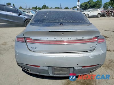 Zdjęcie 6 z 13 samochodu: 2015 LINCOLN MKZ HYBRID VIN:3LN6L2LU3FR612774 - miniatura