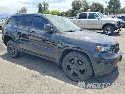 Czwarte zdjęcie samochodu z boku: 2019 JEEP GRAND CHEROKEE LAREDO VIN:1C4RJFAG3KC640966 - miniatura