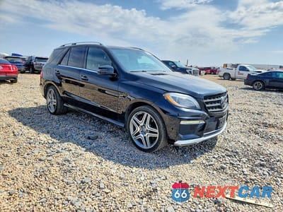 Czwarte zdjęcie samochodu z boku: 2015 MERCEDES-BENZ ML 63 AMG VIN:4JGDA7EB6FA567555 - miniatura