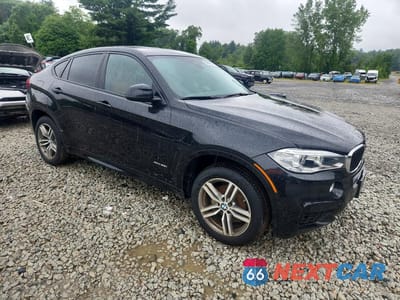 Czwarte zdjęcie samochodu z boku: 2019 BMW X6 XDRIVE35I VIN:5UXKU2C52K0Z65590 - miniatura