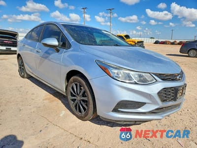 Czwarte zdjęcie samochodu z boku: 2017 CHEVROLET CRUZE LS VIN:1G1BC5SM4H7131716 - miniatura