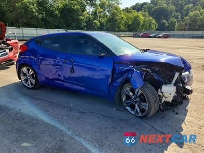 Czwarte zdjęcie samochodu z boku: 2013 HYUNDAI VELOSTER BASE VIN:KMHTC6AD4DU110262 - miniatura