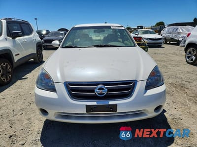Piąte zdjęcie samochodu w środku: 2003 NISSAN ALTIMA BASE/S/SL VIN:1N4AL11D93C188531 - miniatura