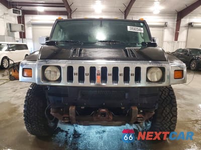 Piąte zdjęcie samochodu w środku: 2003 HUMMER H2 VIN:5GRGN23U83H113399 - miniatura