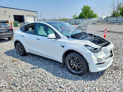 Czwarte zdjęcie samochodu z boku: 2024 TESLA MODEL Y VIN:7SAYGDEE6RA296103 - miniatura