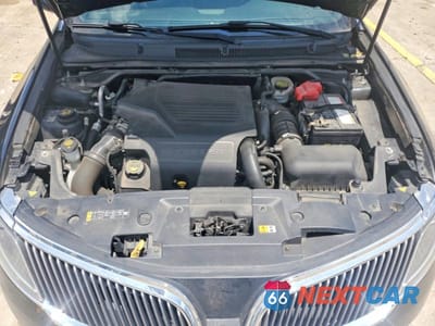 Zdjęcie 11 z 12 samochodu: 2015 LINCOLN MKS VIN:1LNHL9FT0FG600755 - miniatura