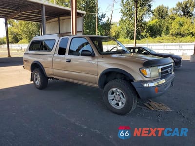 Czwarte zdjęcie samochodu z boku: 1999 TOYOTA TACOMA V6 VIN:4TAWN72N9XZ484152 - miniatura