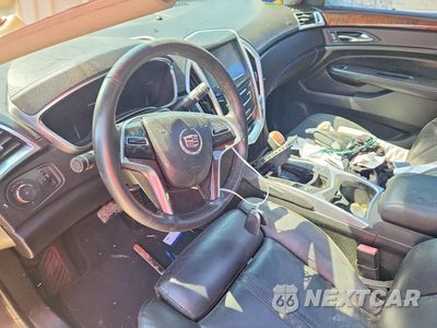 Zdjęcie 8 z 13 samochodu: 2015 CADILLAC SRX PERFORMANCE COLLECTION VIN:3GYFNCE33FS548702 - miniatura