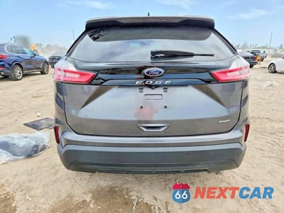 Zdjęcie 6 z 13 samochodu: 2022 FORD EDGE SE VIN:2FMPK4G97NBA22034 - miniatura