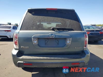 Zdjęcie 6 z 13 samochodu: 2006 HONDA PILOT EX VIN:2HKYF18696H544685 - miniatura