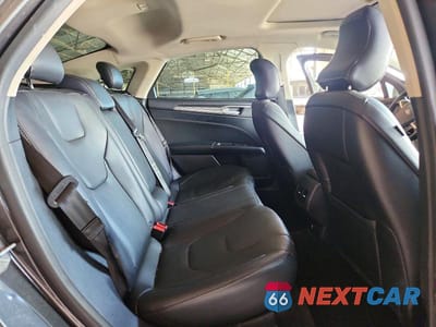 Zdjęcie 10 z 12 samochodu: 2018 FORD FUSION TITANIUM/PLATINUM VIN:3FA6P0D94JR206699 - miniatura