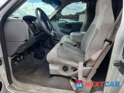 Zdjęcie 7 z 12 samochodu: 1999 FORD F150 VIN:1FTRX18W4XNA79350 - miniatura