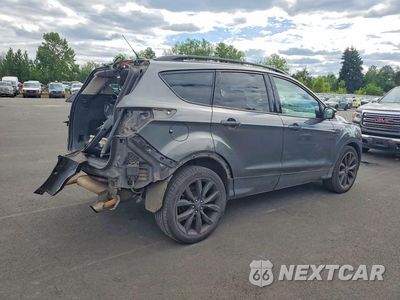 Trzecie zdjęcie samochodu z tyłu: 2017 FORD ESCAPE TITANIUM VIN:1FMCU9JD0HUB61570 - miniatura
